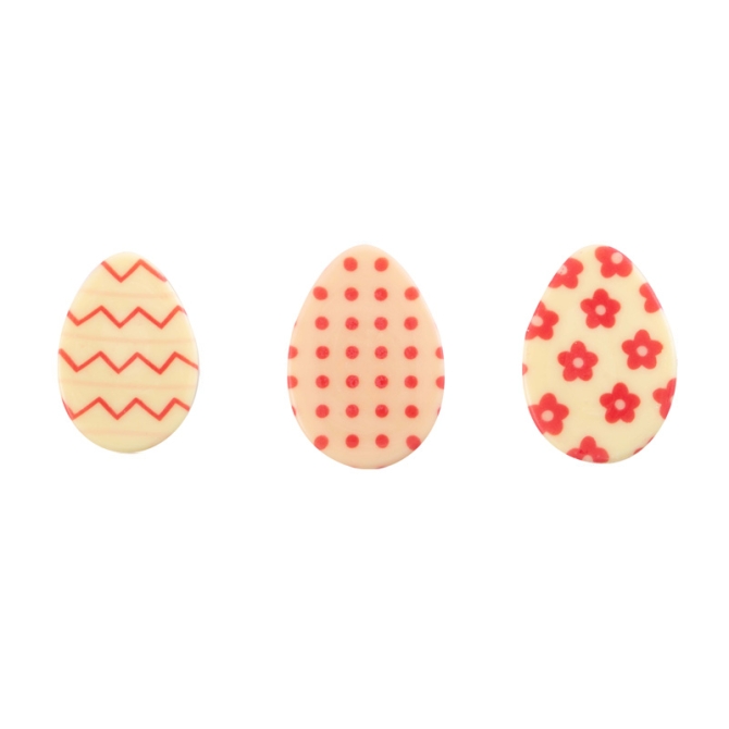 3 huevos de chocolate blanco con motivos rosas 